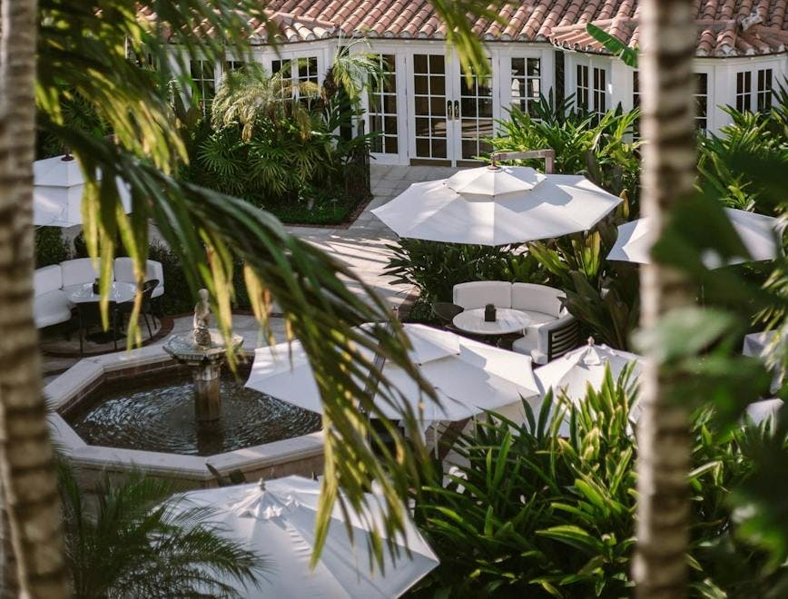 building hotel resort summer housing villa palm tree plant tree outdoors